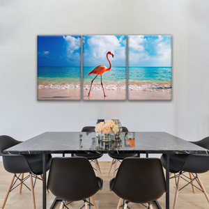 A Flamingo Splashing on The Beach of Caribbean Sea Canvas Print Photos