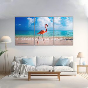 A Flamingo Splashing on The Beach of Caribbean Sea Canvas Print Photos