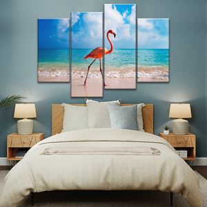 A Flamingo Splashing on The Beach of Caribbean Sea Canvas Print Photos