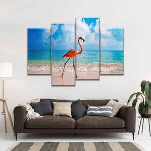 A Flamingo Splashing on The Beach of Caribbean Sea Canvas Print Photos