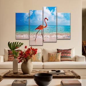 A Flamingo Splashing on The Beach of Caribbean Sea Canvas Print Photos