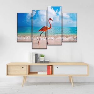 A Flamingo Splashing on The Beach of Caribbean Sea Canvas Print Photos