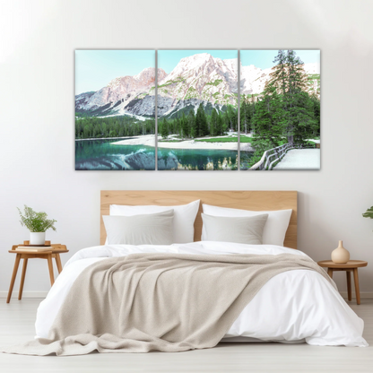 Lush Coniferous Trees Beside Lake Under The Snow-capped Mountains Wall Art